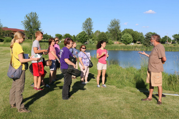 Robert Bohanan, an ecologist at WISCIENCE, helped develop “Econauts” and often reinforces learning with field trips to the lake. <i>Photo courtesy of Amber Levenhagen of the Verona Press</i>
